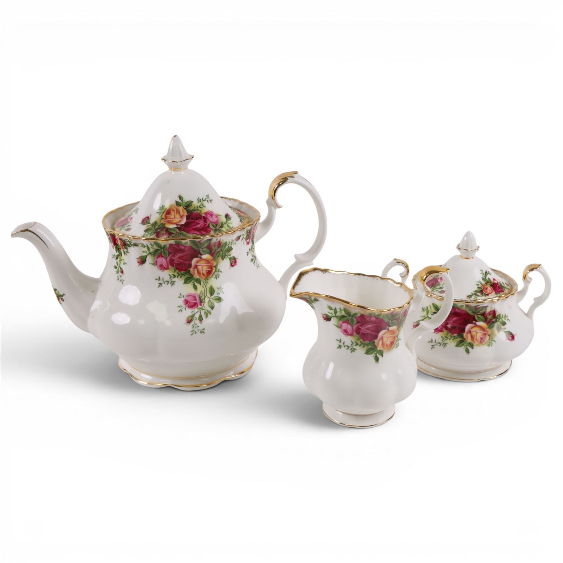 Royal Albert Country Rose tea service for six, comprising teapot, milk jug, covered sucrier, dessert plates, two sandwich plates, cups and saucers 