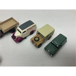 Over forty 1:76 scale die-cast models of cars and commercial vehicles; some boxed; and eight small scale models of motorcycles; all unboxed