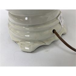 Modern pierced oriental white ceramic vase shaped table lamp, together with a blue and white baluster shaped example decorated with figures upon elephants, both with shades, tallest H83cm incl shade