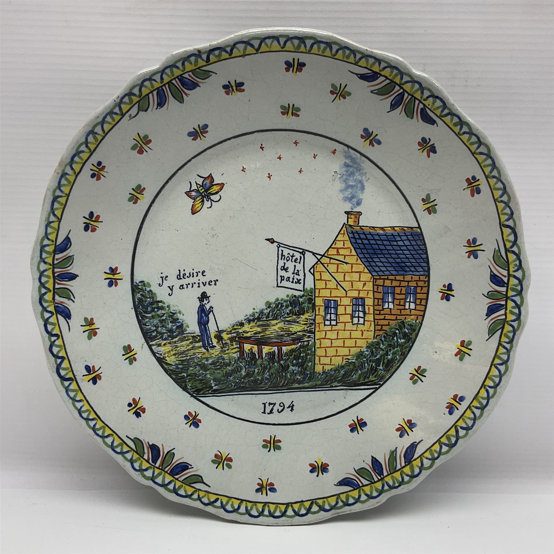 Four French Faience plates, comprising Je suis las de le porter, Le malheur nous reunit, Je desire y arriver and Eveque de Meaux, D24cm  