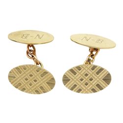 Pair of 9ct gold cufflinks with engine turned decoration and engraved initials 'N-B', hallmarked 