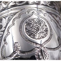 Victorian silver mug, with engraved strapwork decoration, curved and stylised handle, and beaded edge to rim and spreading circular foot, with later gilding to interior, hallmarked George Unite, Birmingham 1872, H9.5cm, approximate weight 3.72 ozt (115.8 grams)