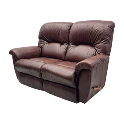 La-Z-Boy - manual reclining three piece suite - two seater sofa (W165cm, H105cm); and two armchairs (W98cm), upholstered in brown leatherette
