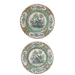 Pair of Canton Famille Rose Medallion plates decorated with exotic birds and plants, with ...