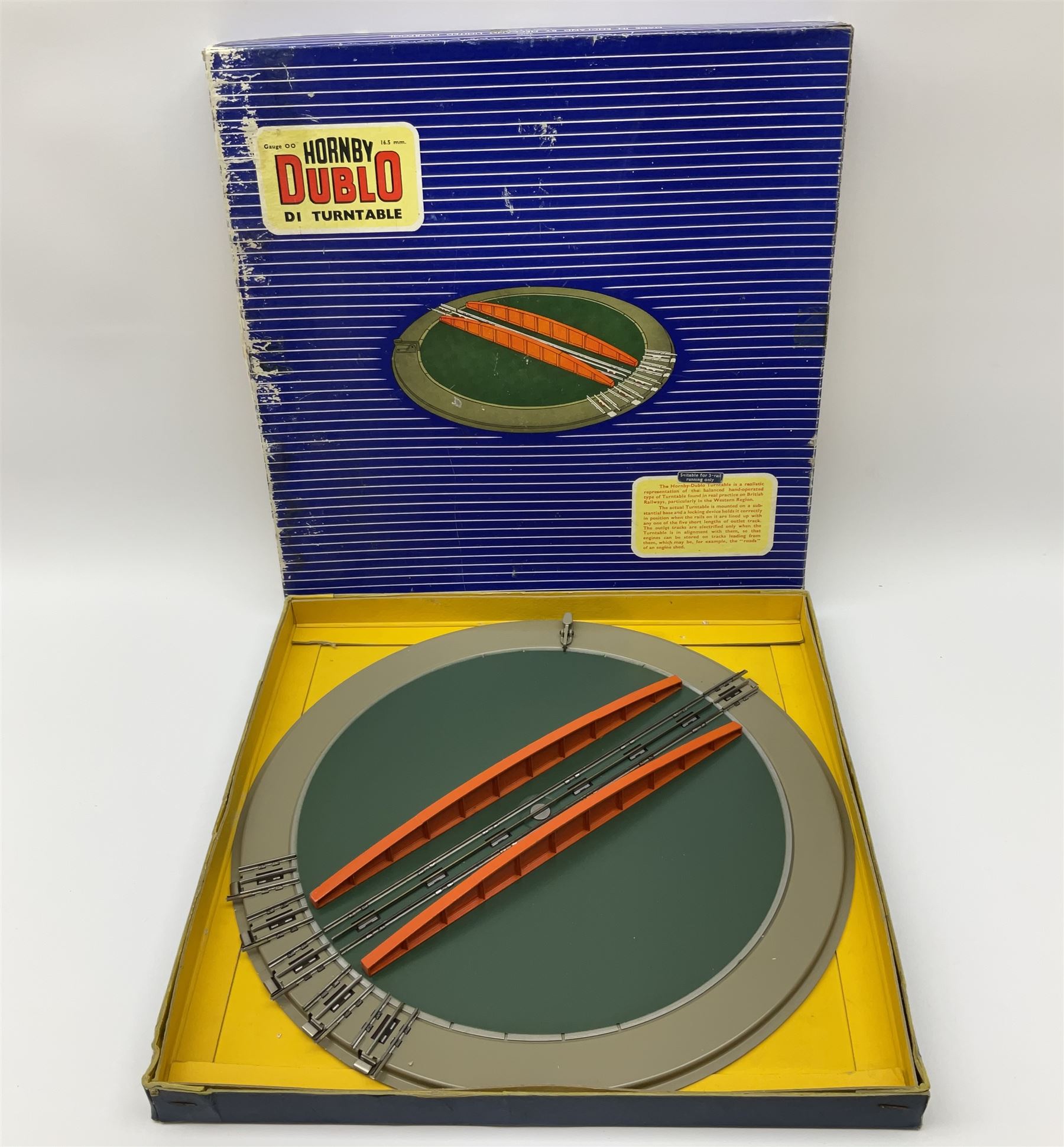 Hornby Dublo - six D1 accessories comprising Turntable; Through Station with white edges and separately boxed Platform Extension with Wall; Signal Cabin with orange roof and pack of station names; Level Crossing; and Island Platform; all boxed (6)