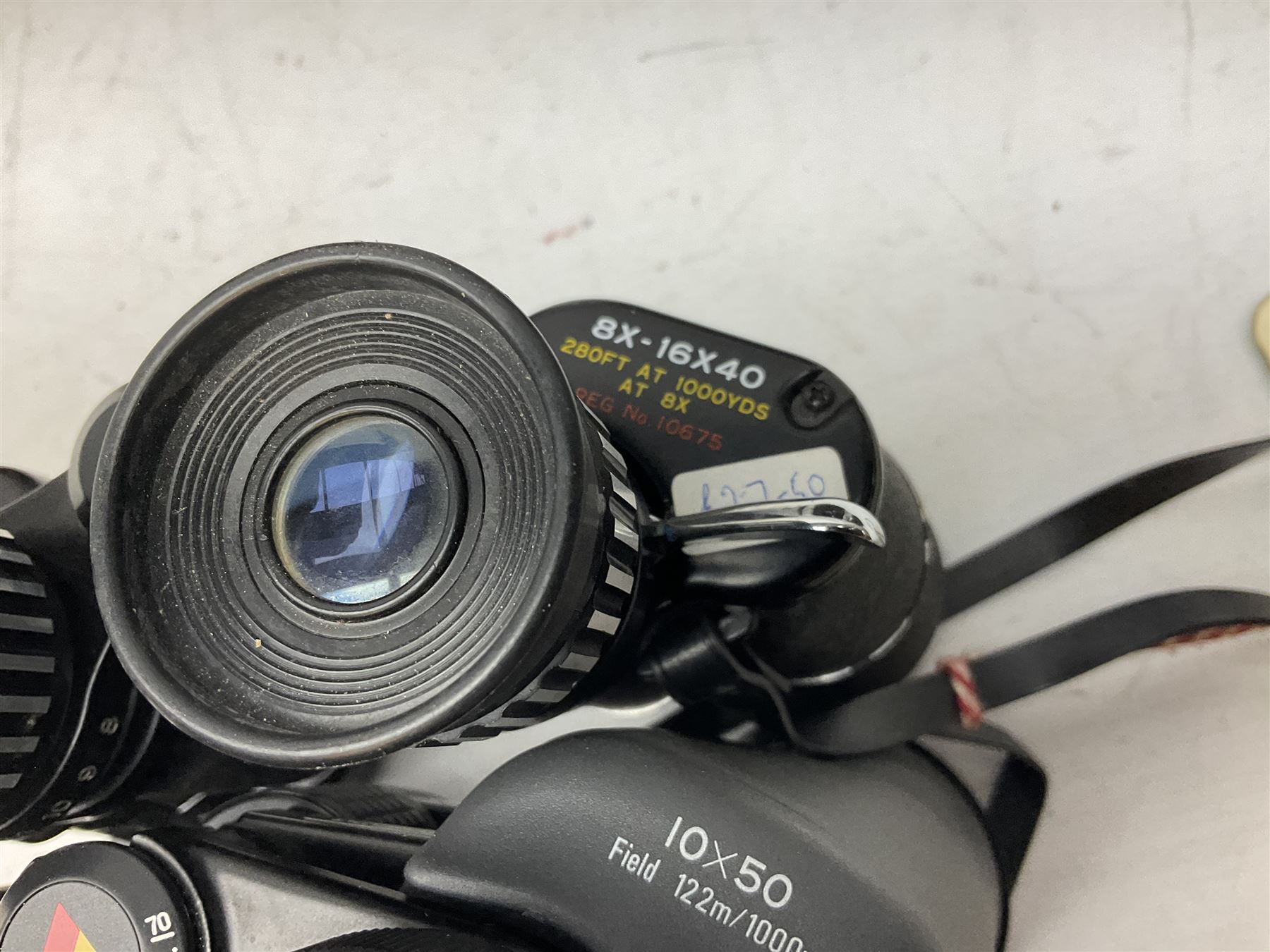 Eleven cased pairs of binoculars to include Summit 8x30,  Concord 8x40, Tasco no. 106 8x - 16x40, Chinon 10x50, Tokina 7x42 Field, Zoom 6x- 12x32 etc