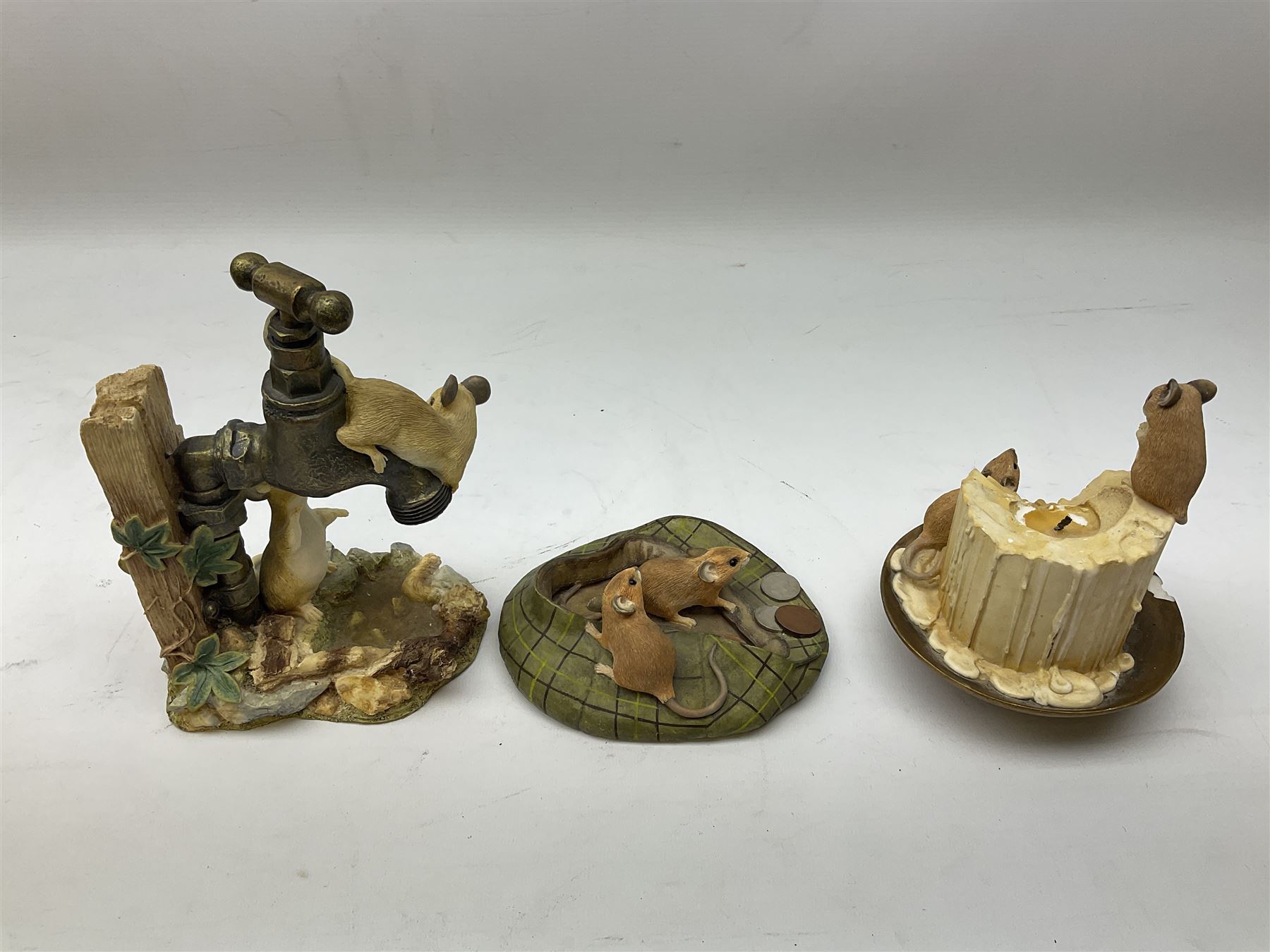 Border Fine Arts, swimming otter, together with three country artists figures, mice on candle stick, mice on garden tap, mice in cap, otter H26cm