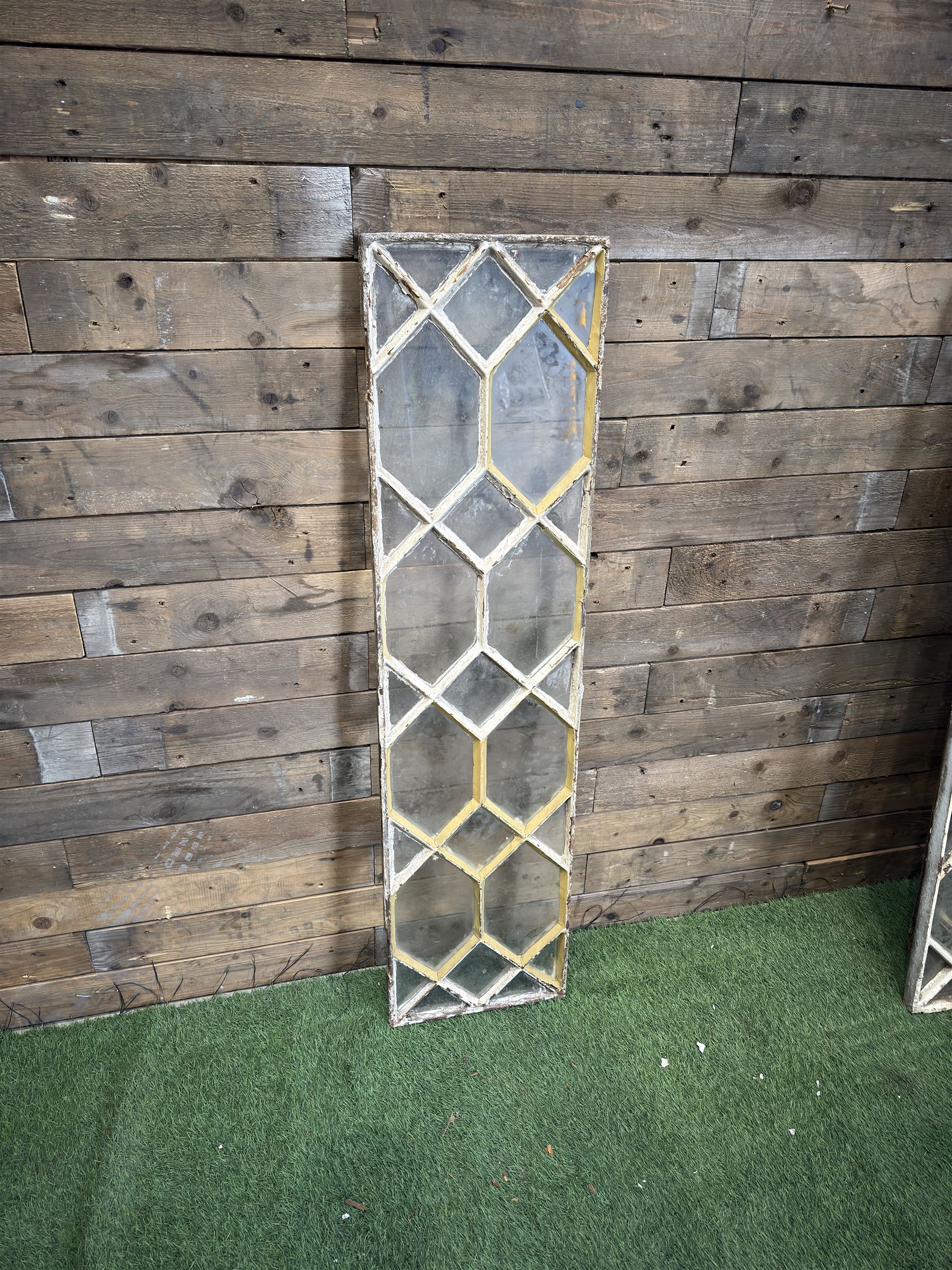 Four 19th century cast iron windows, lattice glazed in white painted finish, 