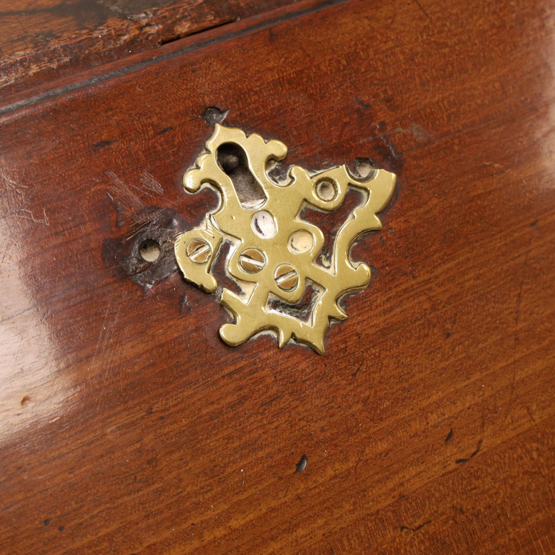 George III mahogany bureau of large proportions, the fall-front enclosing fitted interior with fluted column secret compartments and assorted pigeonholes and correspondence drawers flanking central cupboard, over four graduating cock-beaded drawers with original brass swan-neck handles, raised on bracket feet