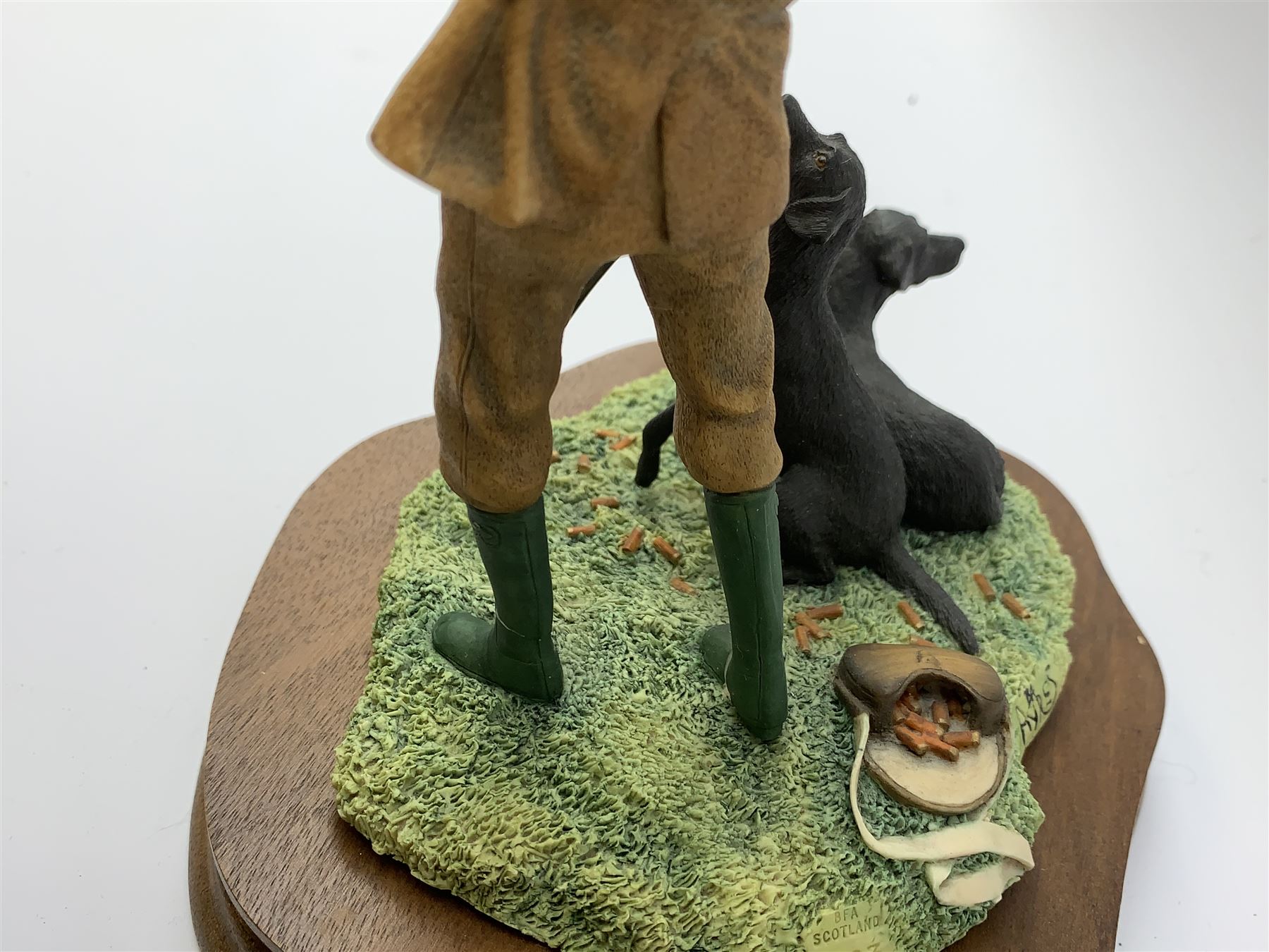 Three Border Fine Arts models, Spring Lambing, model no JH6, by Ray Ayres, King of the Castle, model no JH37, by David Walton, and Reaching for the high bird, with black Labradors, by Ray Ayres, each upon wooden base