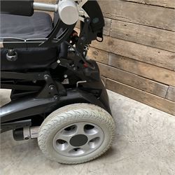 Permobil LSA Lifestand seated and standing wheelchair