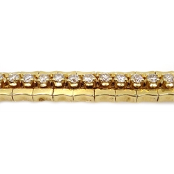  Gold diamond line bracelet consisting of forty three brilliant cut diamonds, stamped 14KT  