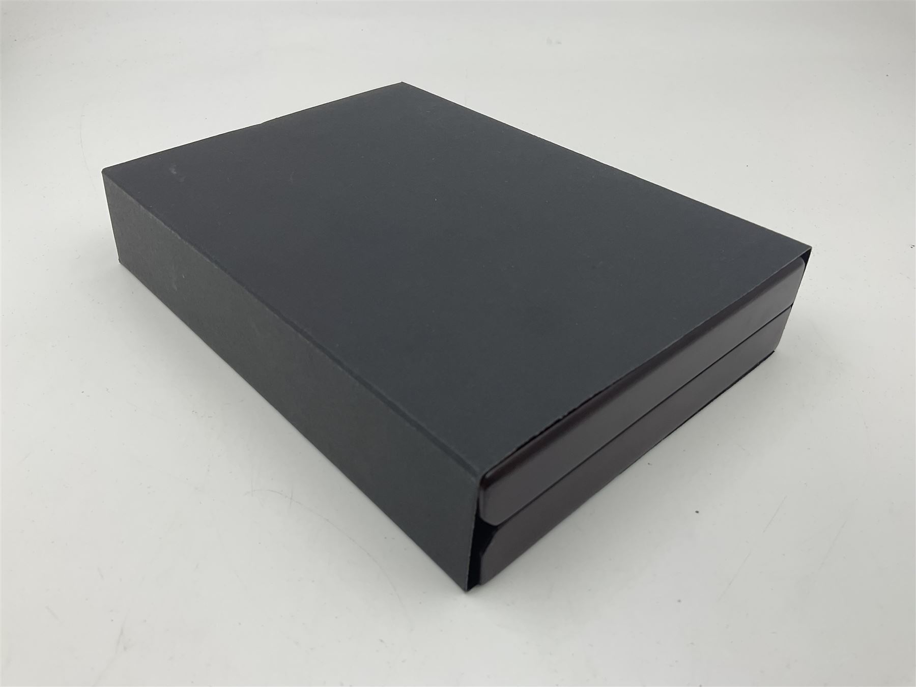 Group Captain Sir Douglas Bader gold spitfire commemorative, 9ct gold medallion mounted with a model of a Spitfire made from aluminium from AB910, gross weight 62 grams, cased with certificate