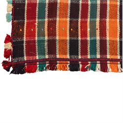 South West Persian Jajim kilim, formed from two joined flatwoven panels, patterned with intersecting stripes in red, orange, green, dark brown and ivory forming a checked design, scattered coloured dot motifs, multicoloured wool tassels along the sides