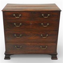 18th century Chippendale style mahogany chest of drawers, the moulded rectangular top above two short and three long drawers fitted with brass swan neck handles, raised upon original shaped bracket feet
