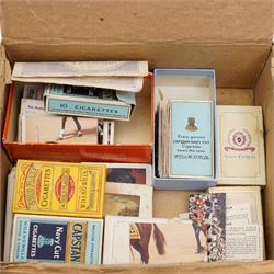 Case of dentist implements, cigarette card album, various loose cards, cigarette dispenser, die cast model vehicles, Lord of the Rings film cell montage etc