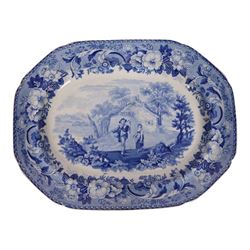 Two 19th century blue and white transfer printed pottery meat plates, the first by John Rogers & Sons decorated in The Drama Series patter, L54cm, the second by Bathwell & Goodfellow decorated in the Rural Scenery Traveller pattern, L43.5cm