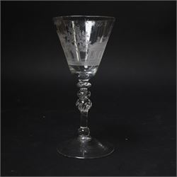 Dutch engraved Newcastle light baluster glass, circa 1760, the funnel bowl engraved with a two storey country house and church flanked by trees, beneath the inscription ‘T WELVAREN VAN LANDT ENKERK’ (The prosperity of the Country and Church), upon a multi knopped stem with beaded knop and basal knop, over conical foot, H18cm



