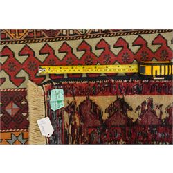 
Oman tribal design rug, field decorated with horizontal bands of stylised birds, flowerheads, stars and hooked geometric motifs in red, ivory, ochre and pale blue, enclosed by serrated ivory and red borders and narrow patterned guard stripes