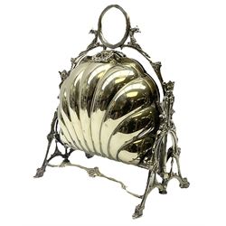 Victorian silver plated biscuit warmer, scalloped shaped dishes and pierced grills, with cradle decorated with mythical beast and acanthus leaves, H27cm