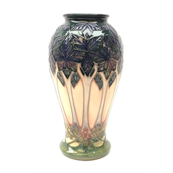 A Moorcroft vase, of baluster form, decorated in the Cluny pattern designed by Sally Tuffin, with impressed and painted marks beneath, H25.5cm.