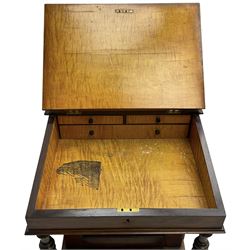 Victorian walnut Davenport, hinged sloping top with inset leather writing surface, enclosing satinwood lined interior with two drawers over faux drawer, fitted with inkwell drawer and pen compartment to the side over four drawers with an opposing false set, raised on spiral turned supports united by a shaped platform base