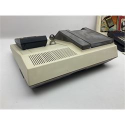 Four 1970s Sinclair electronic calculators - Cambridge in hard case with booklet; Scientific Programmable with Program Library and booklet; Scientific in hard case; and Oxford 300 in soft case with booklet; together with Texas PC-100 SR56 programmable slide-rule calculator on base station with readout, two booklets, keys and cover, serial no.9103093