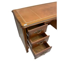 Younger Furniture - cherry wood desk, the shaped top with leather inset, fitted with six drawers
