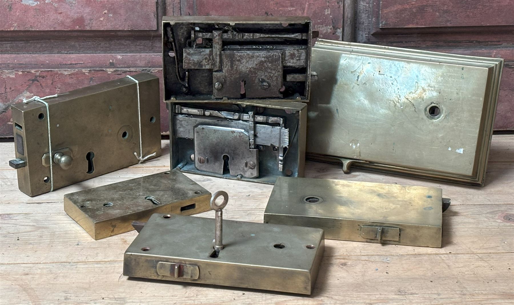 Seven 19th century brass cased rim locks, one with key, largest  26cm x 16cm - COLLECTION BY APPOINTMENT FROM: The White House, Thirsk Road, Easingwold, York, YO61 3NF - CALL 01723 507111 TO ARRANGE