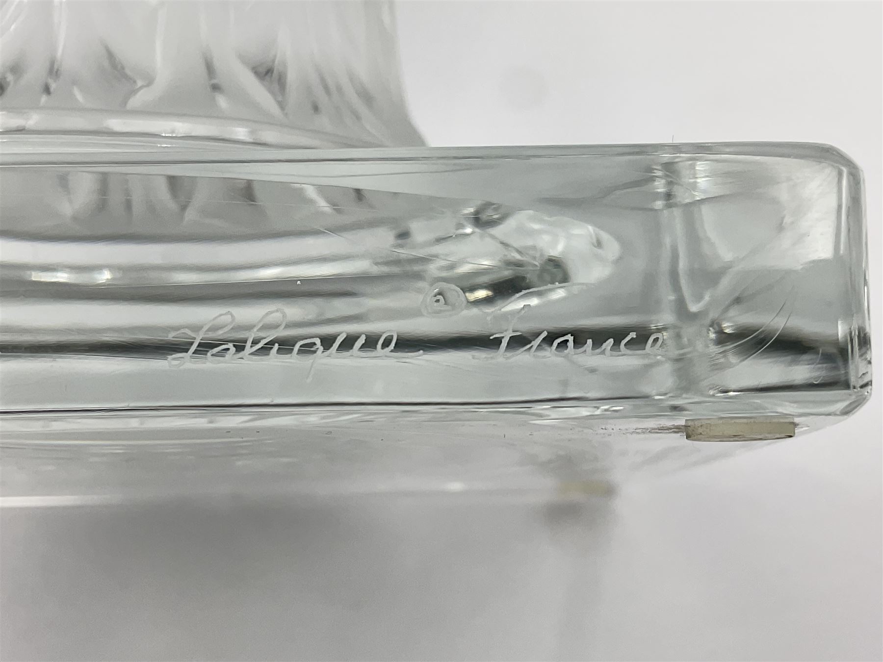 Large and impressive Lalique Versailles pattern glass vase, of classical baluster form with gadrooned flared rim, the body moulded in relief with fruiting vines above part fluting, upon a spreading circular foot with moulded decoration, and plain square plinth base, signed Lalique France to side of plinth, overall H35cm, with original box 