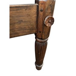 Georgian design Indian sheesham hardwood framed four poster bed, lattice slats to the top supported by reeded cylindrical and octagonal column uprights, the pierced stepped headboard carved with floral motifs, with associated mattress