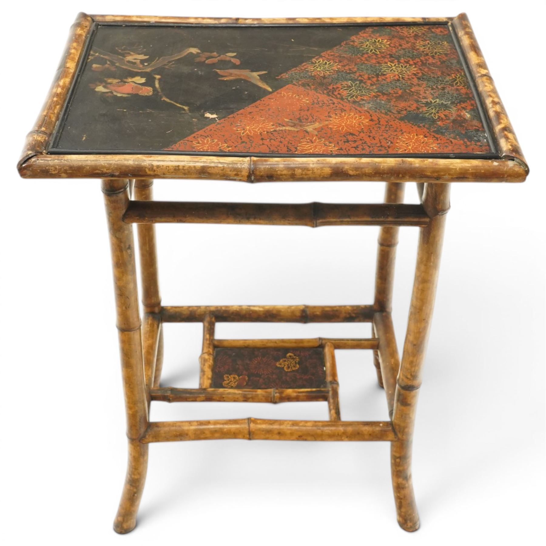 Bamboo and chinoiserie occasional table, rectangular top with geometric print and foliate design, raised on bamboo supports united by an undertier