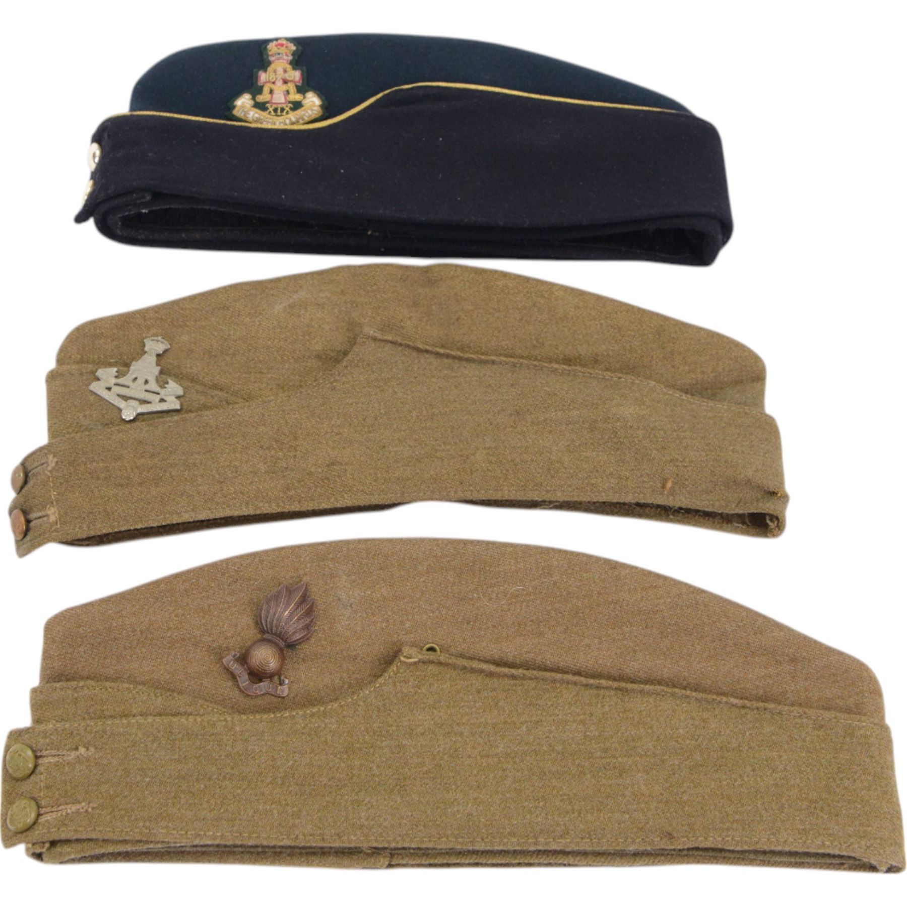 Collection of military caps, including Green Howards forage cap by Herbert Johnson, Officer's Royal Artillery cap by Bates Hatters, Glengarry cap by Mackie and Co etc 