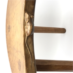'Mouseman' oak three legged stool with kidney shaped dished seat, by Robert Thompson of Kilburn, 37cm x 30cm, H46cm