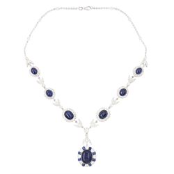 18ct white gold sapphire and diamond milgrain set necklace, oval cabochon cut sapphire sur...