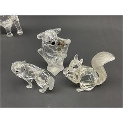 Twenty nine Swarovski Crystal animals, to include koala and baby, in frosted tree branch, elephants, polar bears, squirrel, monkeys, panda, unicorn and snails, etc 