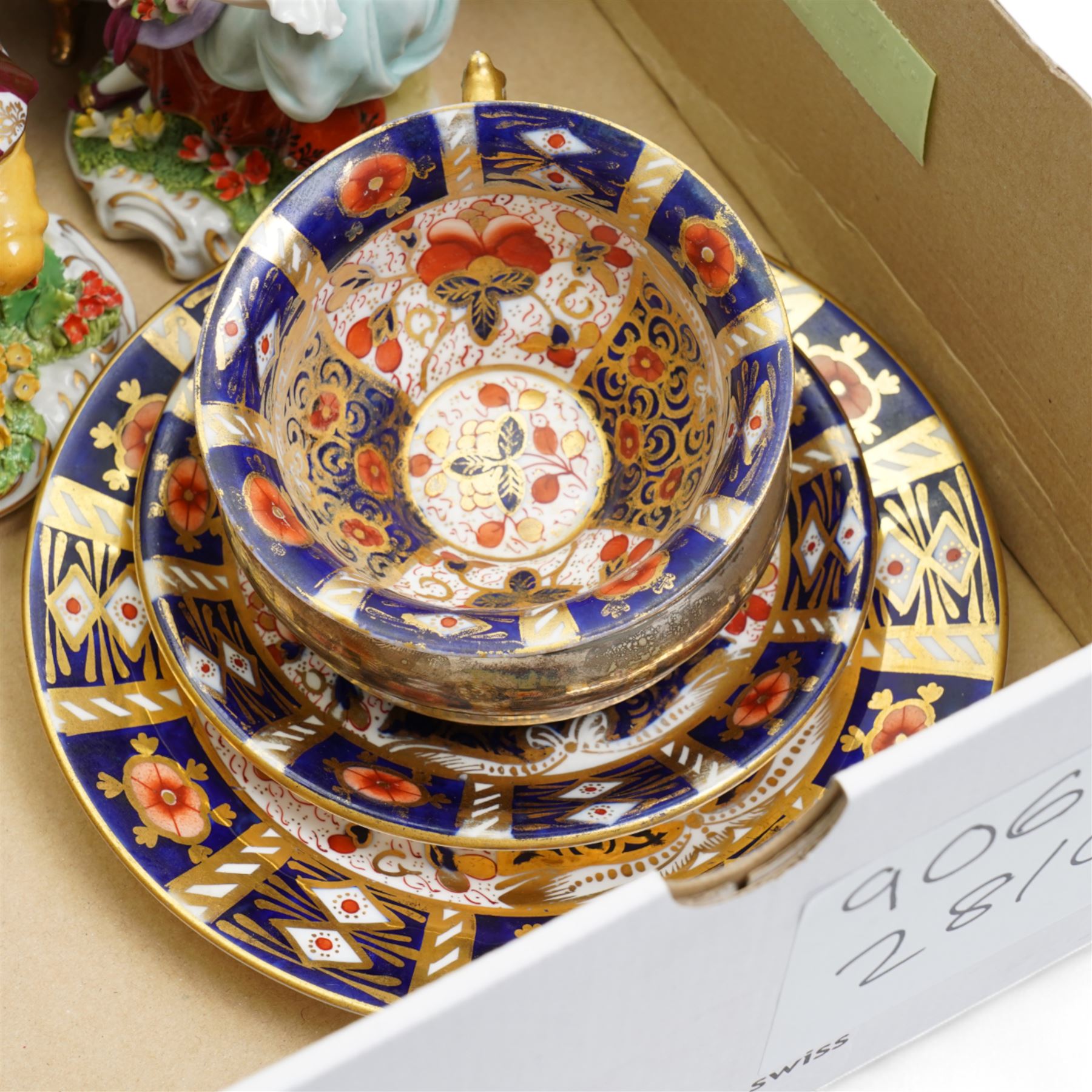 Silver bottle coaster, four limoges egg trinket boxes, two sitzendorf figures, and a Pointons imari trio