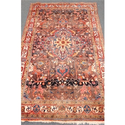  Persian style red ground rug, central medallion, repeating border, 268cm x 163cm  