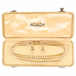 Ciro three strand faux pearl necklace wit 9ct gold clasp, and matching earrings with 9ct g...