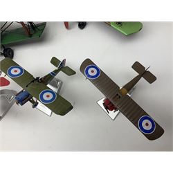 Three large painted tin-plate models of bi-planes, wingspan 32cm; and five Corgi Aviation Archive die-cast models of bi-planes on stands; all unboxed (8)