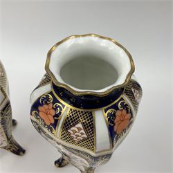 Pair of early 20th century Royal Crown Derby Imari 1128 pattern vases, of tapering straight sided form with waisted neck and frilled rim, upon four splayed feet, with printed and painted marks beneath including illustration date codes for 1911 and 1920, H17cm