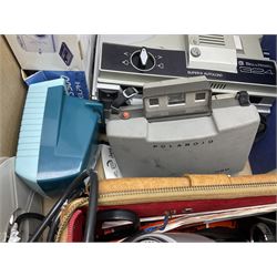 Collection of camera and equipment, to include Canon PowerShot S500, Cosmic 35, polaroid 320, etc, in two boxes  