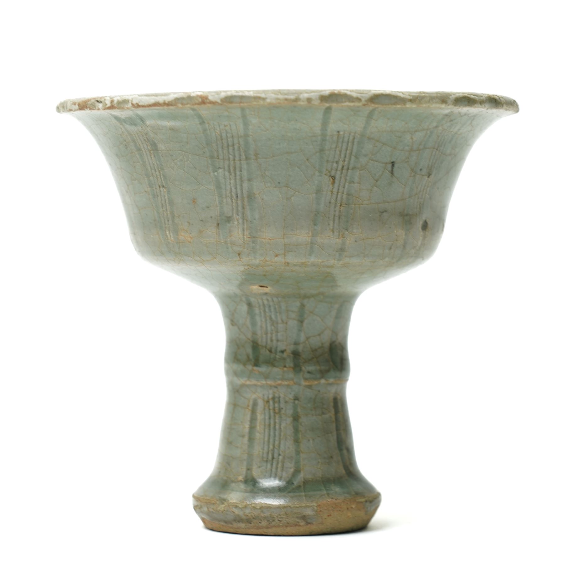 Chinese Ming dynasty Longquan celadon stem cup, of flared form rising from a splayed foot, incised decoration to stem and bowl, with fluted rim, unmarked, H10cm