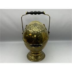 Victorian brass coal scuttle, of helmet form with turned ebonised handles, H48cm