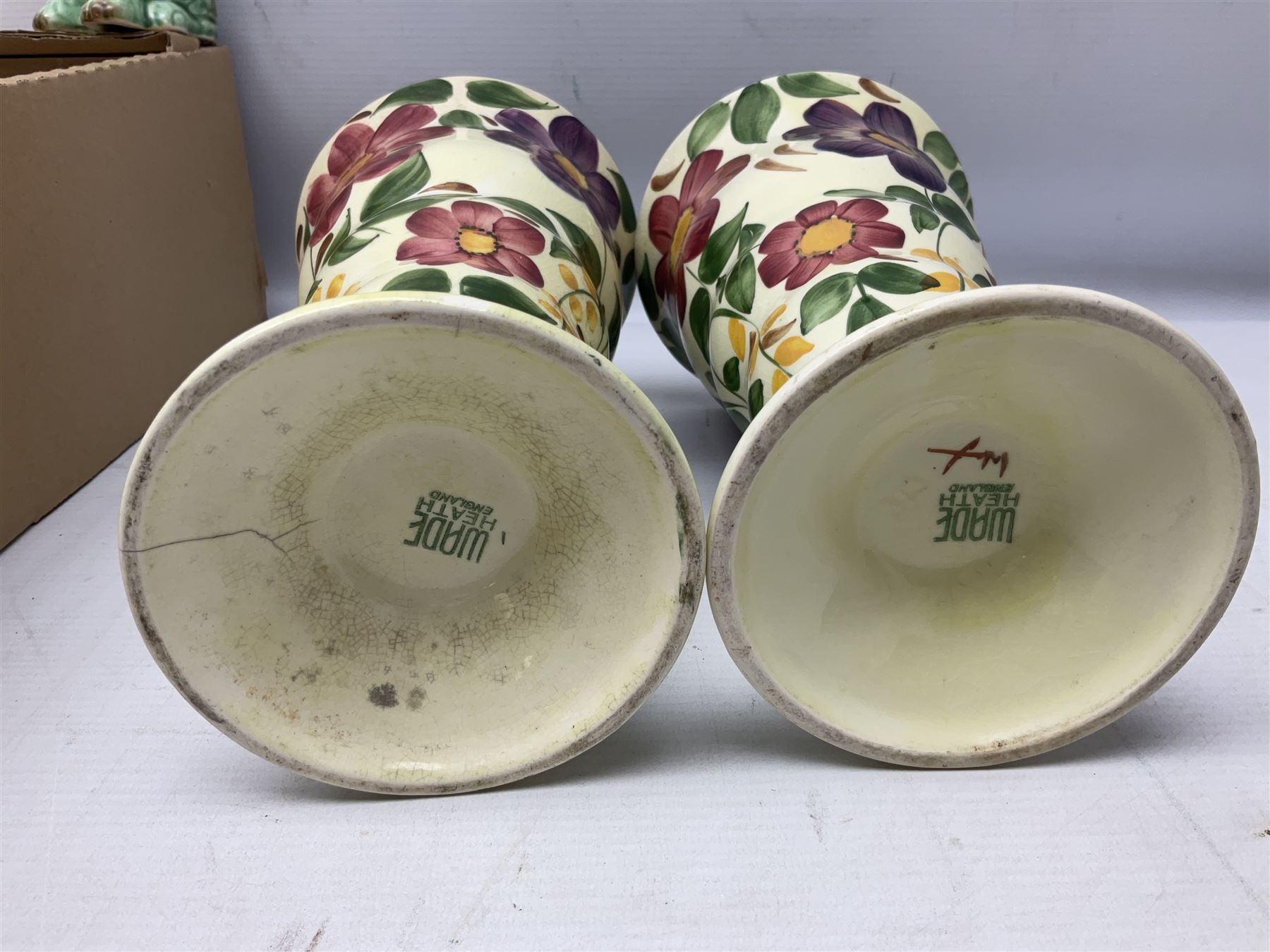 Sylvac green seated dog, together with pair Wade Heath vases, wall charger and other collectables, in two boxes  