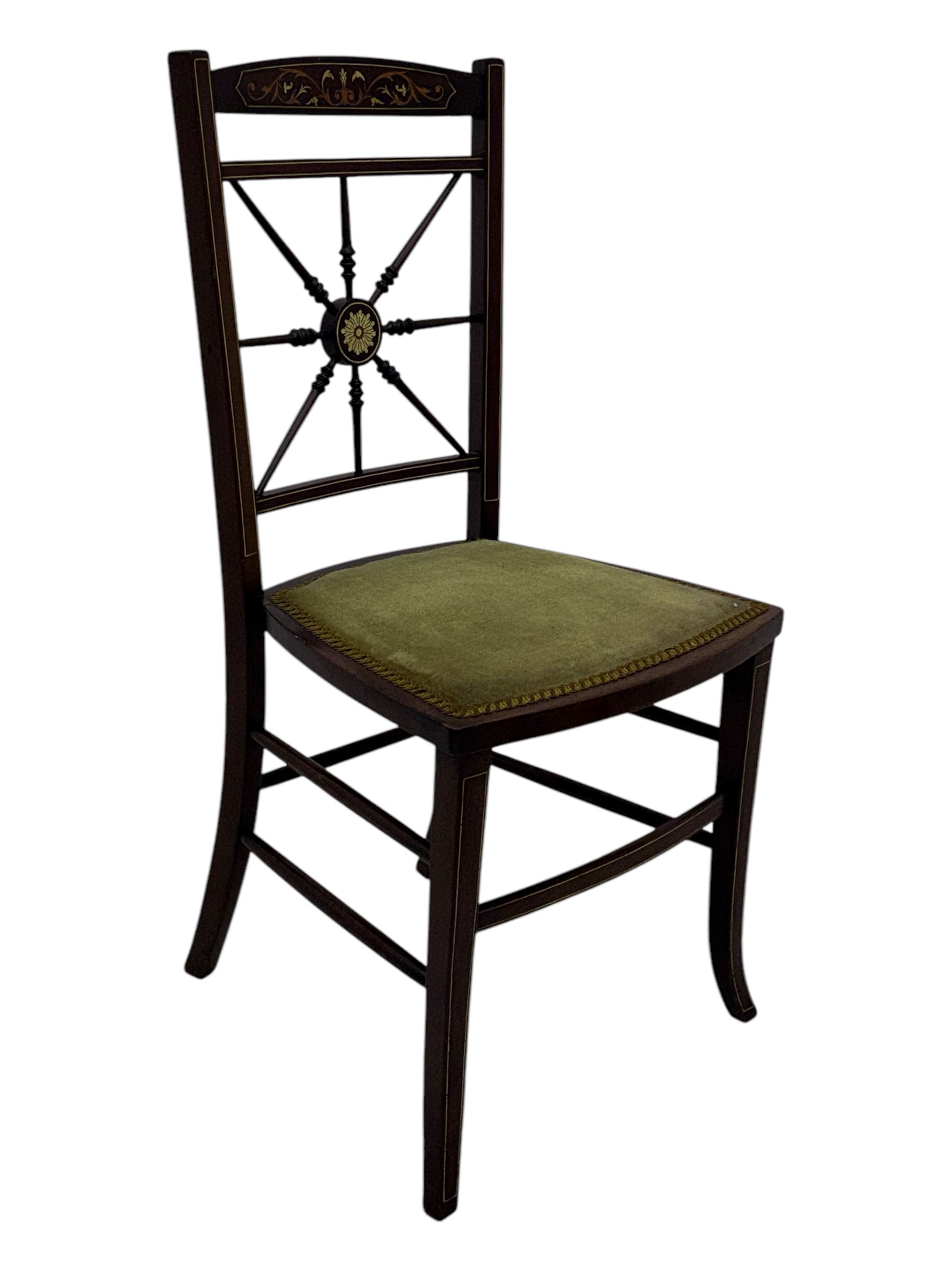 Late 19th century black-painted cane seat chair; early 20th century radial spindle-back chair with green upholstery; early 20th century mahogany single-drawer side table; mid-20th century carved wooden stool with harp motif; early 20th century hexagonal bamboo stand; two oval mirrors (7)