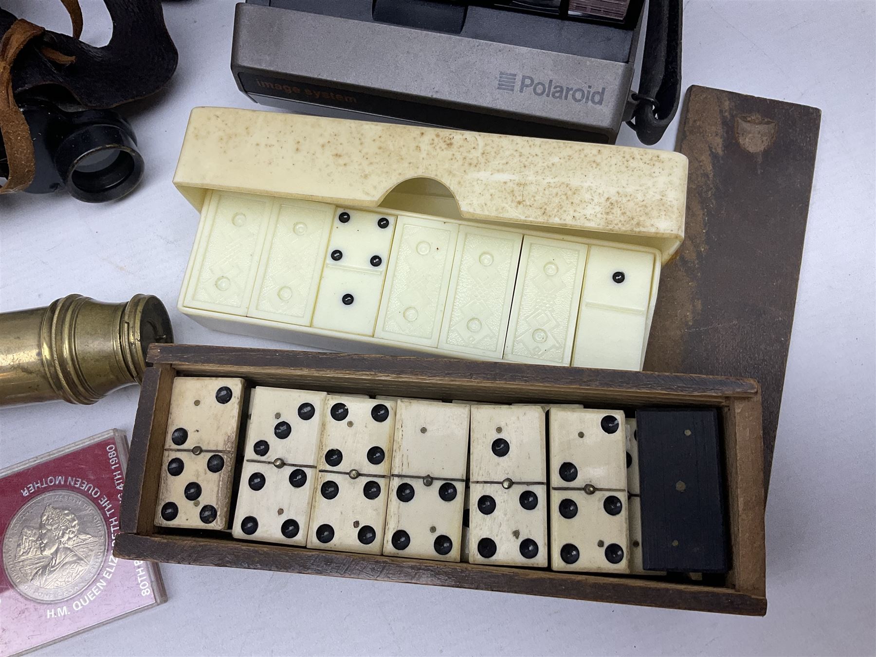 Brass telescope, together with Zenith 7 x 50 field binoculars, two polaroid cameras and other cameras and equipment 