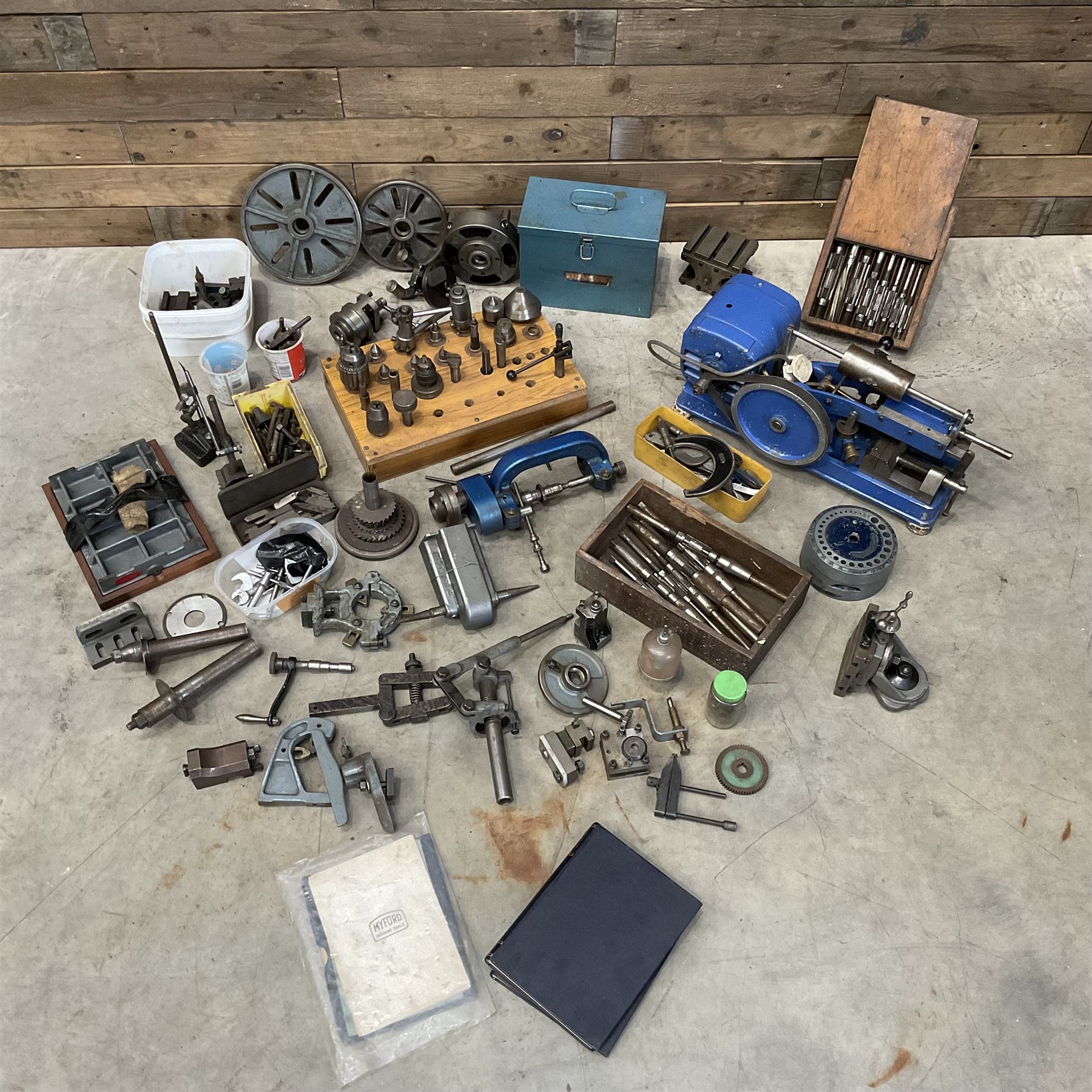 Myford Super 7 metal turning lathe with extensive collection of attachments, chucks, collets, bits; and precision metal saw