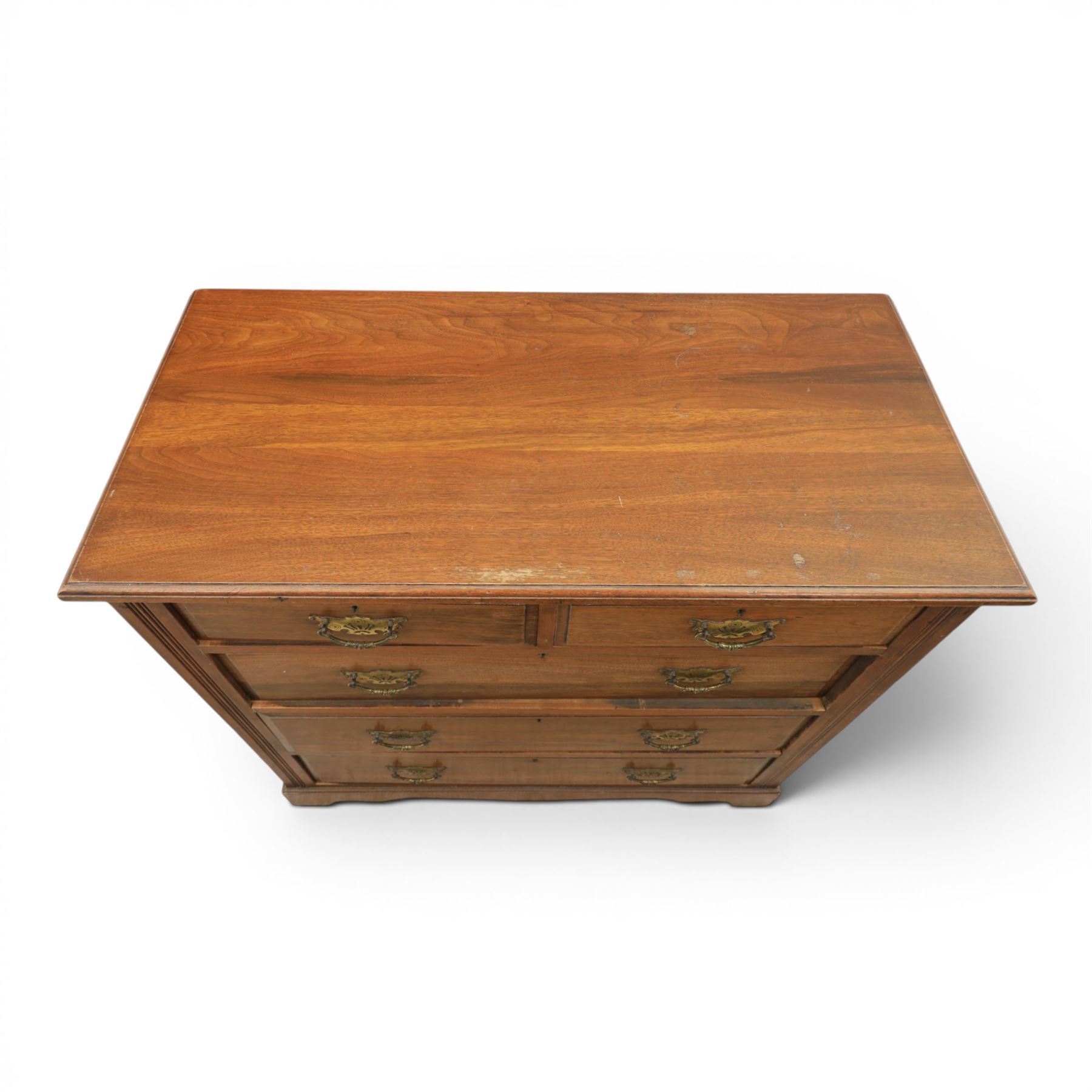 19th century mahogany chest, two short over three long drawers with pierced brass handles, raised on bracket feet 