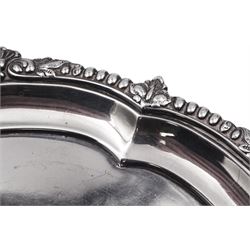 Edwardian silver waiter, of lobed circular form with dart and foliate detailed rim, and engraved monogram to centre, hallmarked Fenton Brothers Ltd, Sheffield 1902, D17.5cm, approximate weight 4.97 ozt (154 grams)